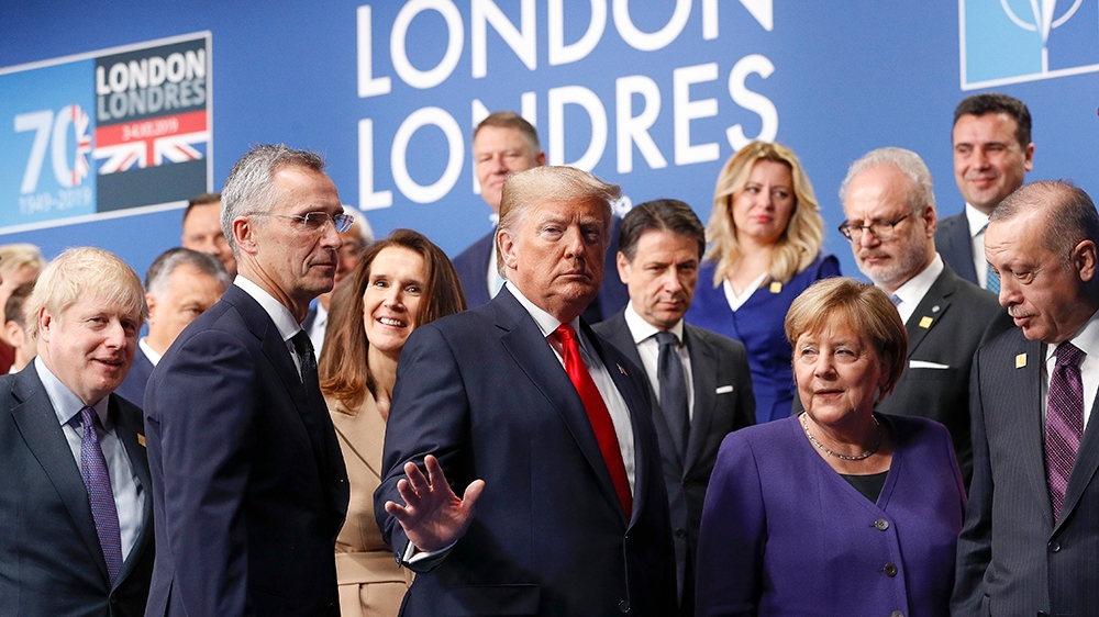 Britain''s Prime Minister Boris Johnson (L), US President Donald Trump (C), German Chancellor Angela Merkel (2R), Turkey''s President Recep Tayyip Erdogan (R) and other NATO leaders leave the stage afte