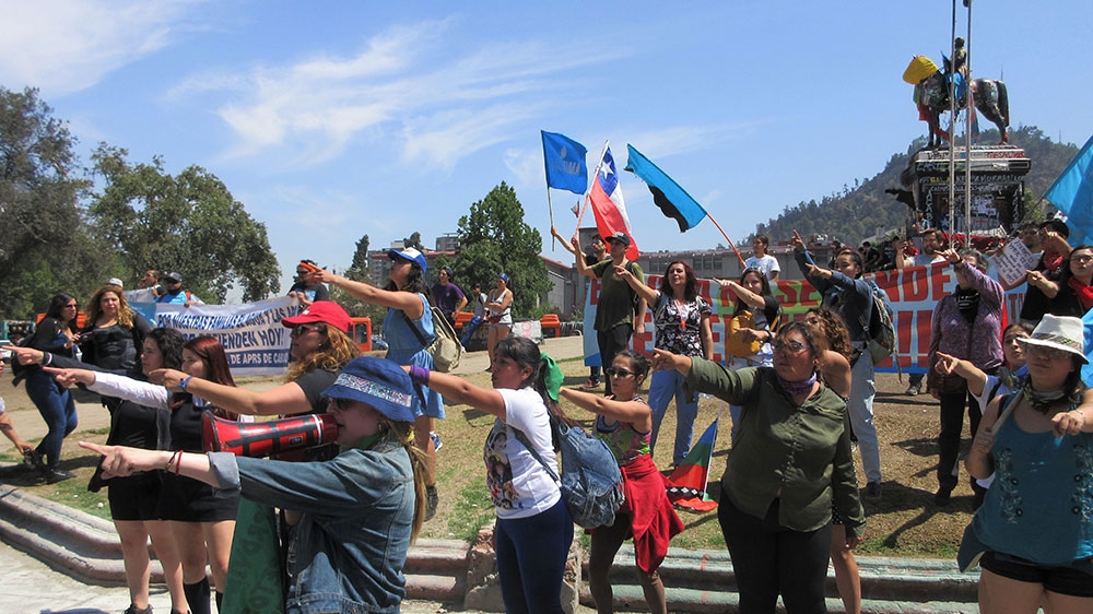 Barbara Astudillo and other women spontaneously perform ‘A rapist in your path’ when police special forces show up to an environmental protest in Santiago