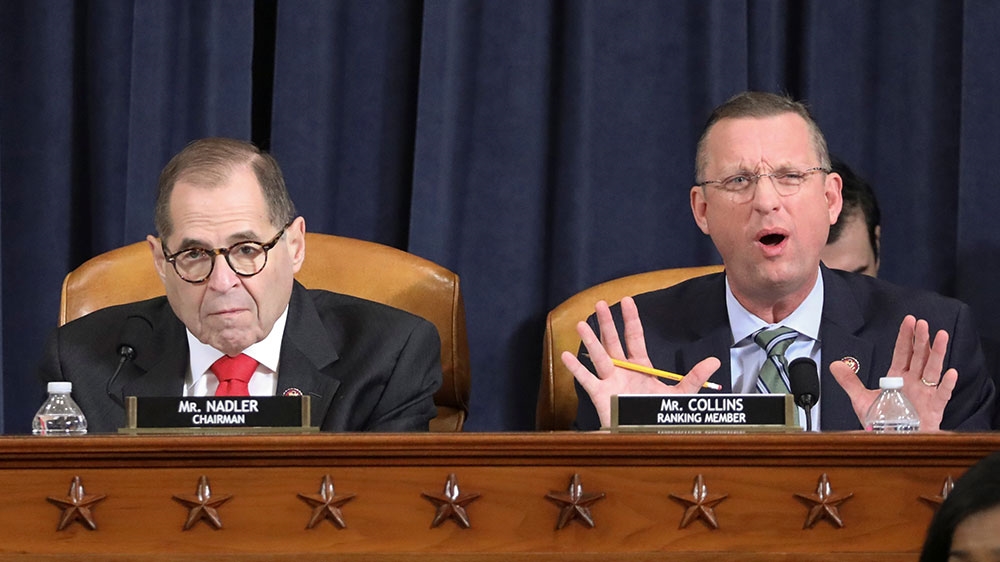 Republican House Judiciary Committee ranking member Doug Collins delivers his opening statement as Chairman Jerrold Nadler listens at the start of a House Judiciary Committee hearing