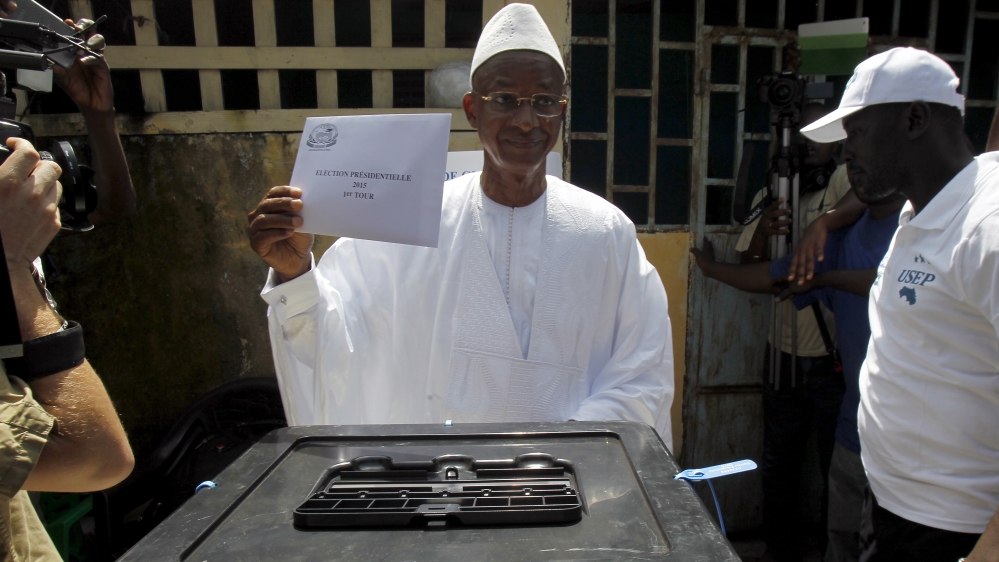 Cellou Dalein Diallo casts his vote at a polling station during a presidential election in Conakry,