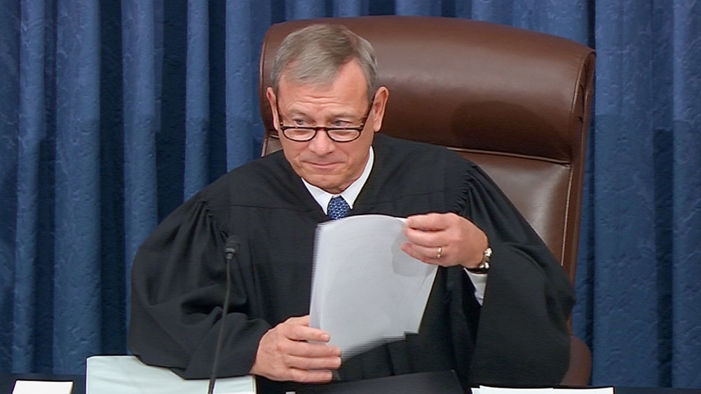 Chief Justice of the United States John Roberts presided during the US Senate impeachment trial of Trump [Reuters]