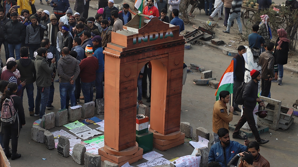 Replica of India Gate installed by the protesters last week which has names of protesters killed in the past one month written on it