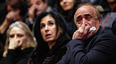 Mourners attending a memorial for the victims of the Ukrainian passenger plane which was shot down in Iran, in Toronto, Ontario, Canada