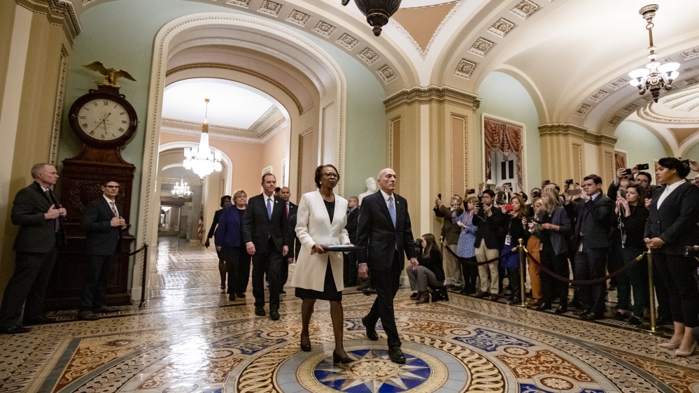 Members of the House of Representatives deliver the articles of impeachment to the Senate on Wednesday