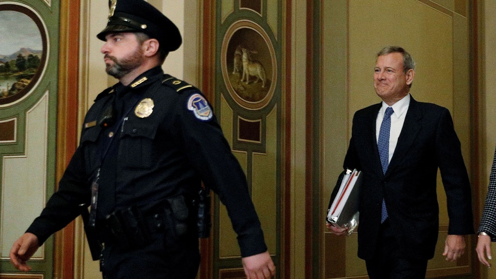 US Supreme Court Chief Justice John Roberts arriving at the US Senate to preside over opening arguments in the Senate’s impeachment trial of President Donald Trump on Capitol Hill in Washington, US