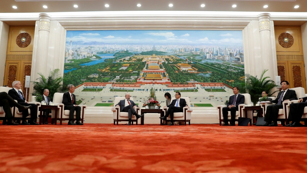 Chairman of the US-China Business Council Evan Greenberg attends a meeting with Chinese Premier Li Keqiang at the Great Hall of the People in Beijing