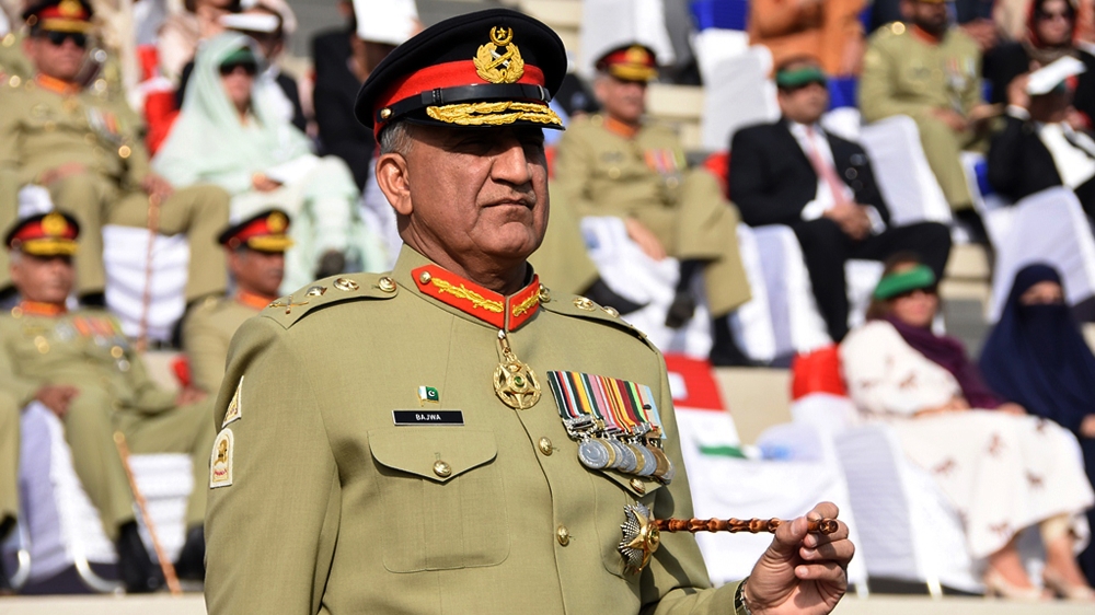 Pakistani Army Chief Gen. Qamar Javed Bajwa attends the Change of Command ceremony in Rawalpindi, Pakistan. Bajwa says he received a phone call from the head of U.S. Central Command, Gen. Joseph Vogel
