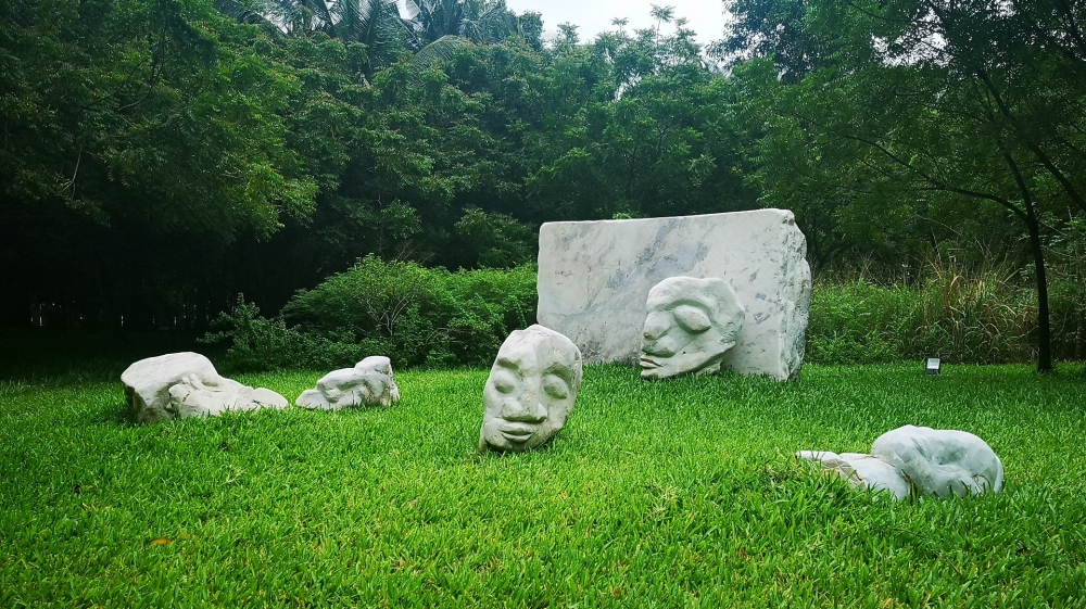 The Council of Elders, a sculpture by Sadikou Oukpedjo in the grounds of the Palais De Lome [Photo courtesy of Sadikou Oukpedjo]