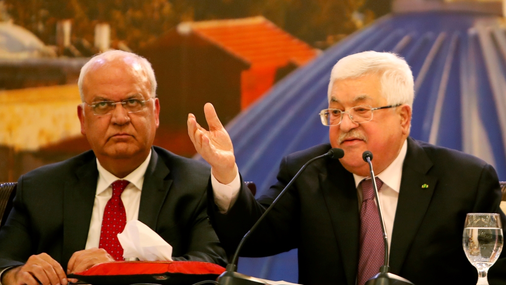 Palestinian President Mahmoud Abbas gestures as he delivers a speech following the announcement by Trump on his Middle East plan