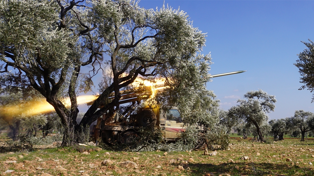 SYRIA-CONFLICT-IDLIB Members of Syria''s opposition National Liberation Front remotely-fire a rocket at a position near the village of al-Nayrab, about 14 kilometres southeast of the city of Idlib