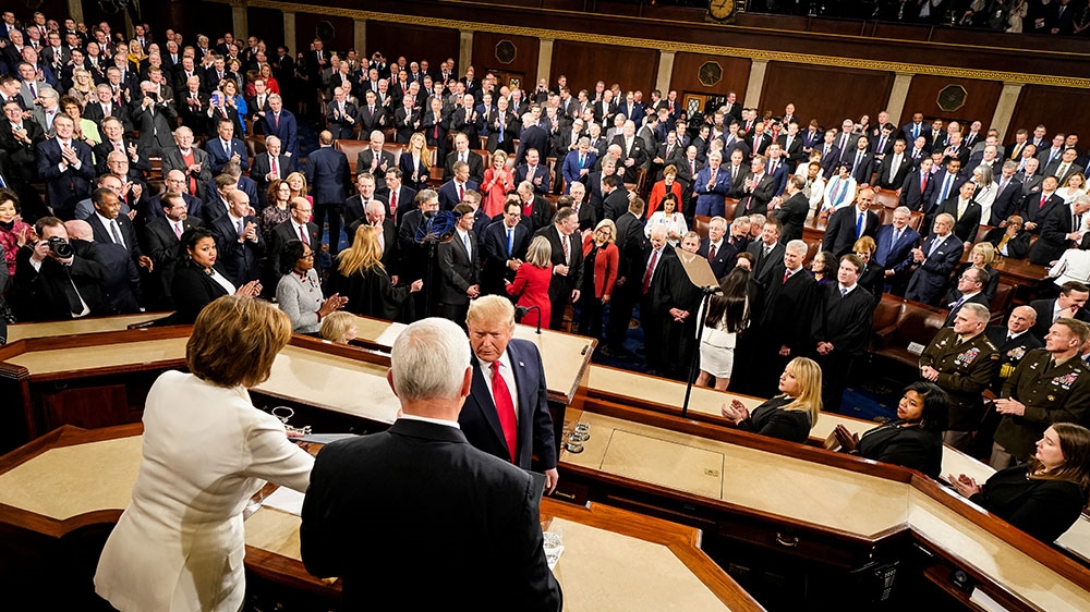 US Vice President Mike Pence and House Speaker Nancy Pelosi look on during Trump’s State of the Union Address