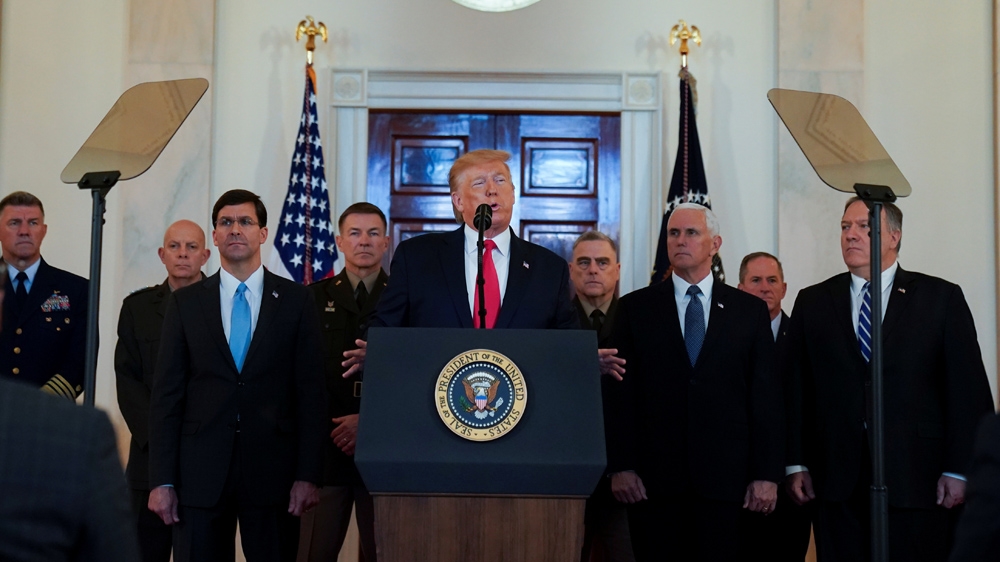 US President Trump delivers a statement about Iran flanked by US Defense Secretary Mark Esper, Army Chief of Staff General James McConville, Chairman of the Joint Chiefs of Staff Army General Mark Milley, Vice President Mike Pence and Secretary of State Mike Pompeo in the Grand Foyer at the White House