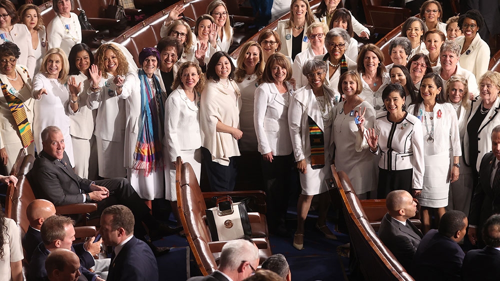 House Democratic women stand before the State of the Union address. [Jonathan Ernst/Reuters] [Daylife]
