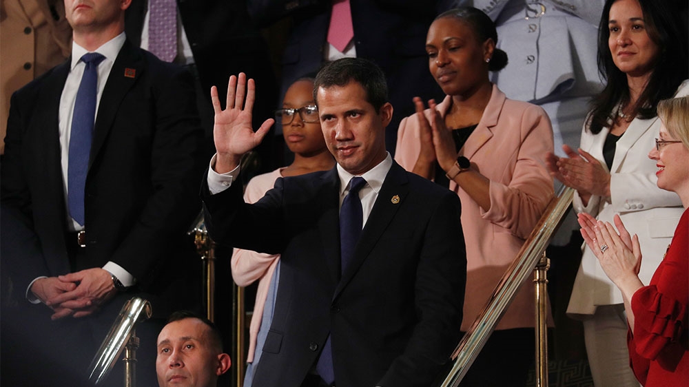 Venezuela’s opposition leader Juan Guaido waving as US President Donald Trump delivers his State of the Union address in front of the Congress in Washington, US