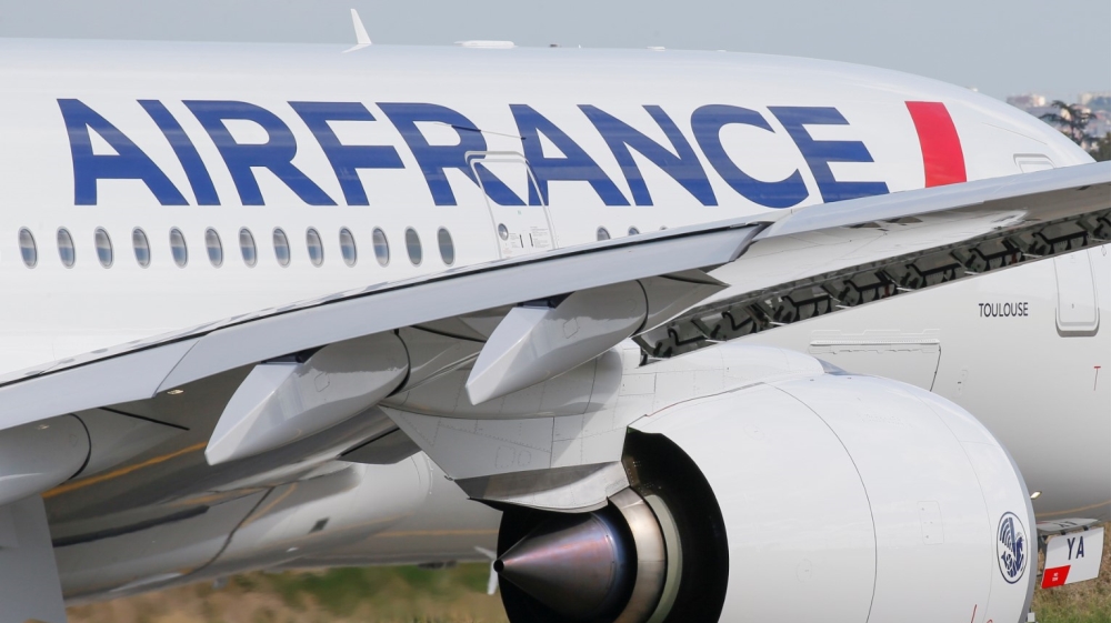 Each passenger boarding an Air France flight had their temperature checked by a special laser gun pointed at the forehead, a supplementary safety measure the airline has decided to enforce