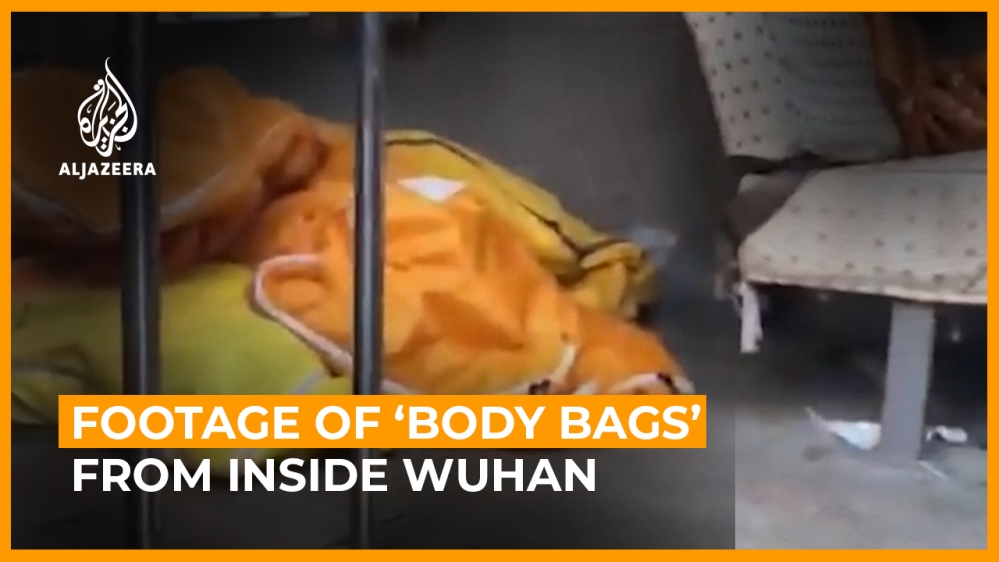 Footage of ''body bags'' from inside Wuhan