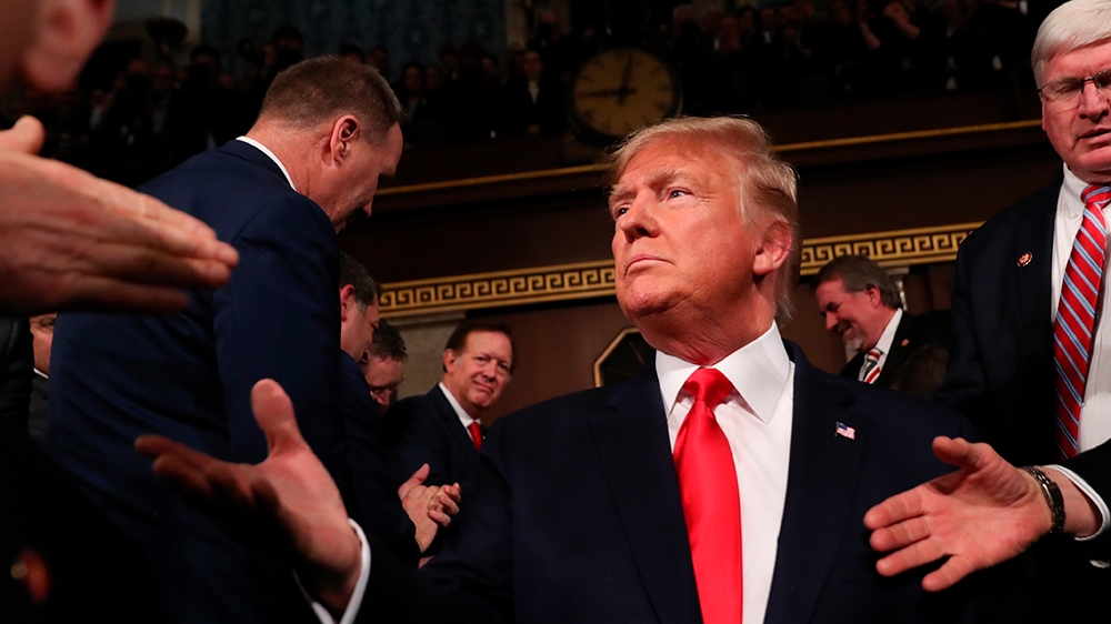 President Donald Trump arrives to deliver his State of the Union address to a joint session of Congress on Capitol Hill in Washington, Tuesday, Feb. 4, 2020. (Leah Millis/Pool via AP)
