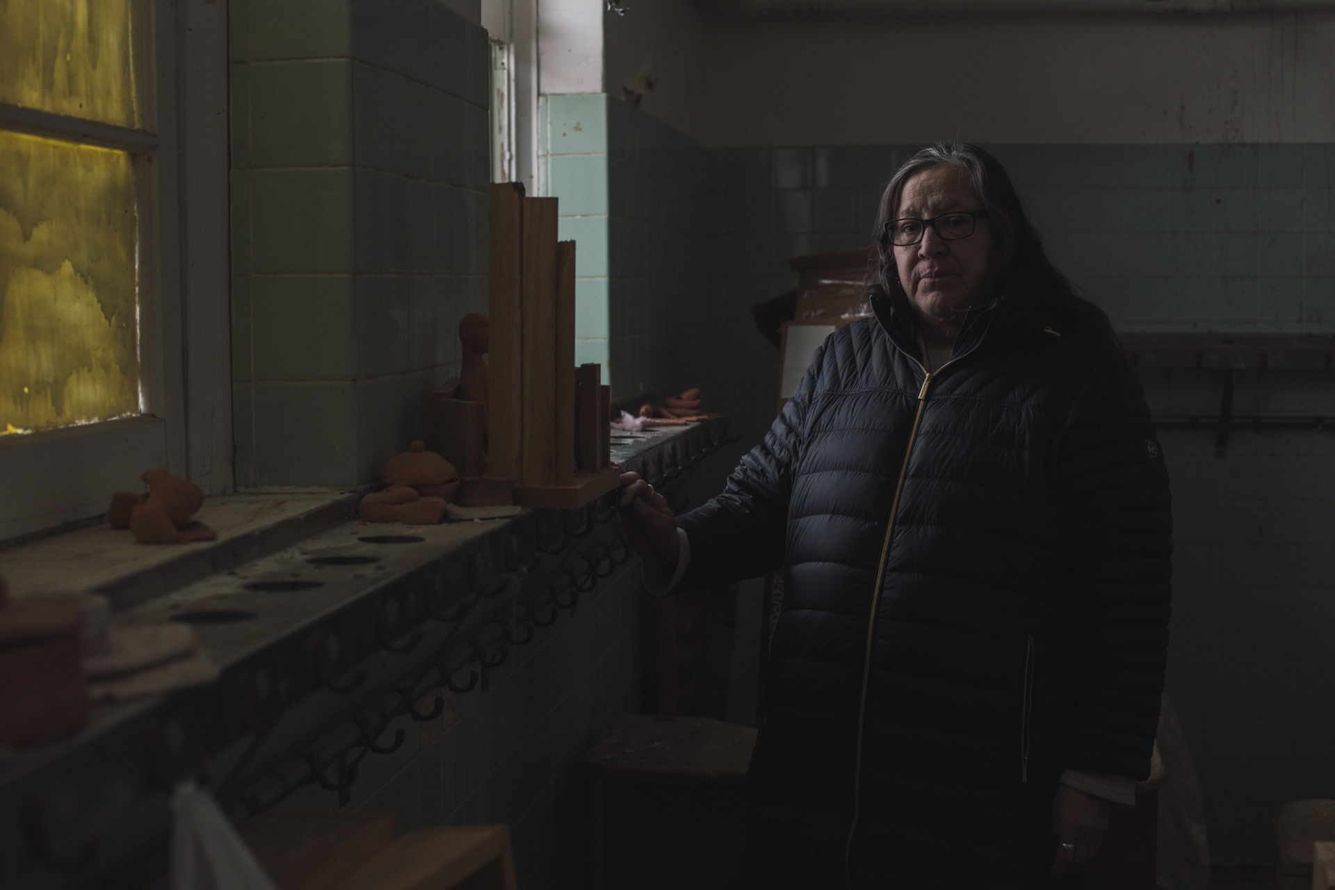 Alsena stands in the place that was her designated spot, when she was a student and called by a number instead of her name