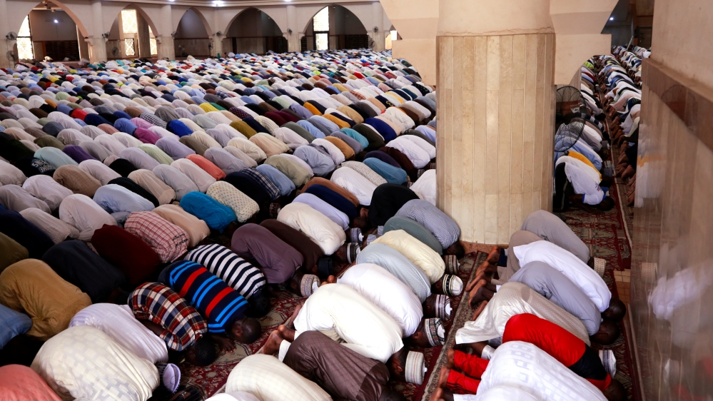 Muslim faithfuls attend Friday prayers at the National Mosque in Abuja, Nigeria