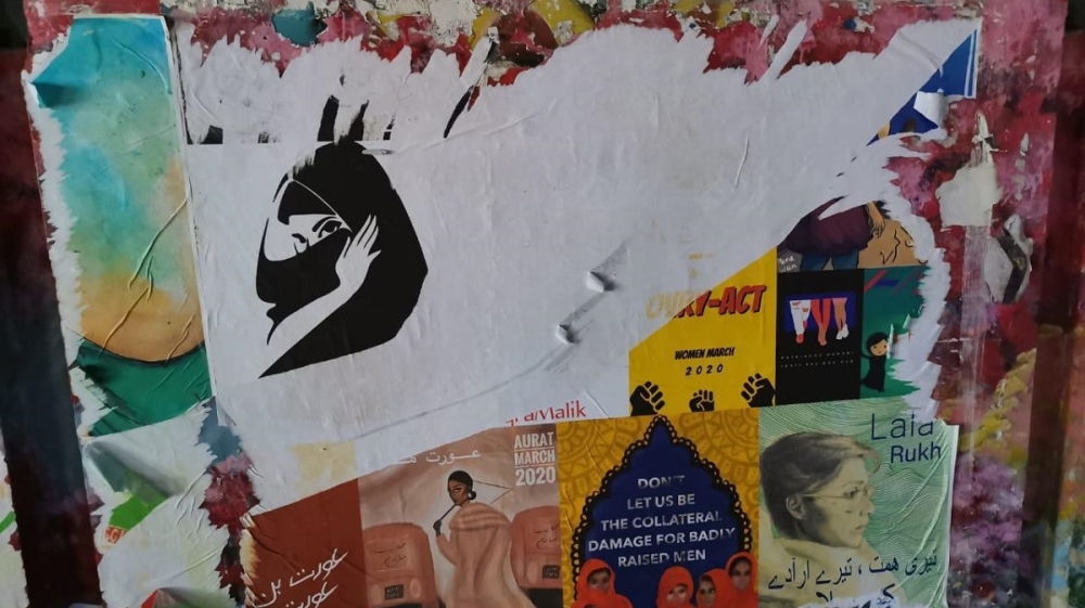 Posters for the women’s march were ripped off walls in Lahore
