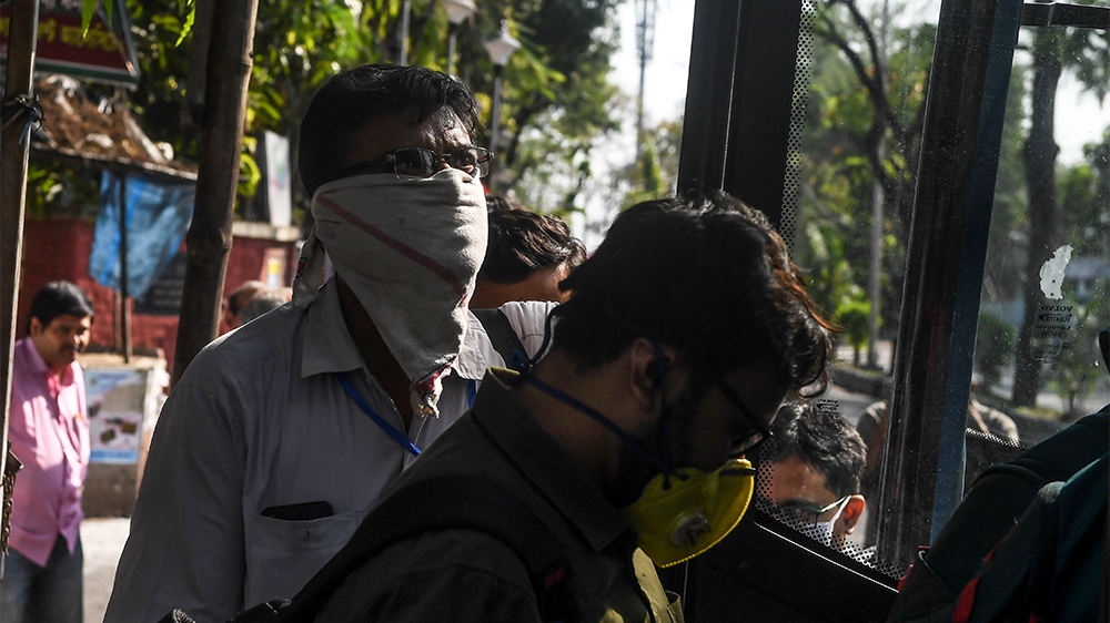 Governmental doctors board a bus in Kolkata
