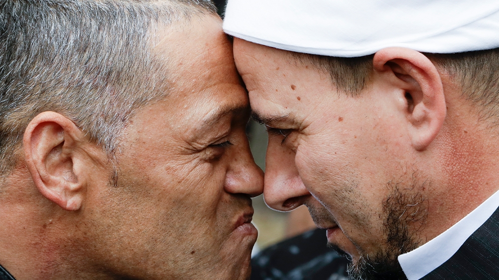 The Imam of the Al Noor mosque Gamal Fouda, right, and Tu Tangata motorcycle club president Derek Tait exchange a hongi outside the mosque in Christchurch on Sunday. Islam is estimated to be the fastest growing religion among Maori