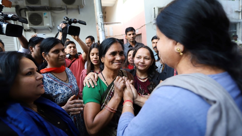 The victim’s mother reacts after the convicts were hanged in New Delhi [AFP]