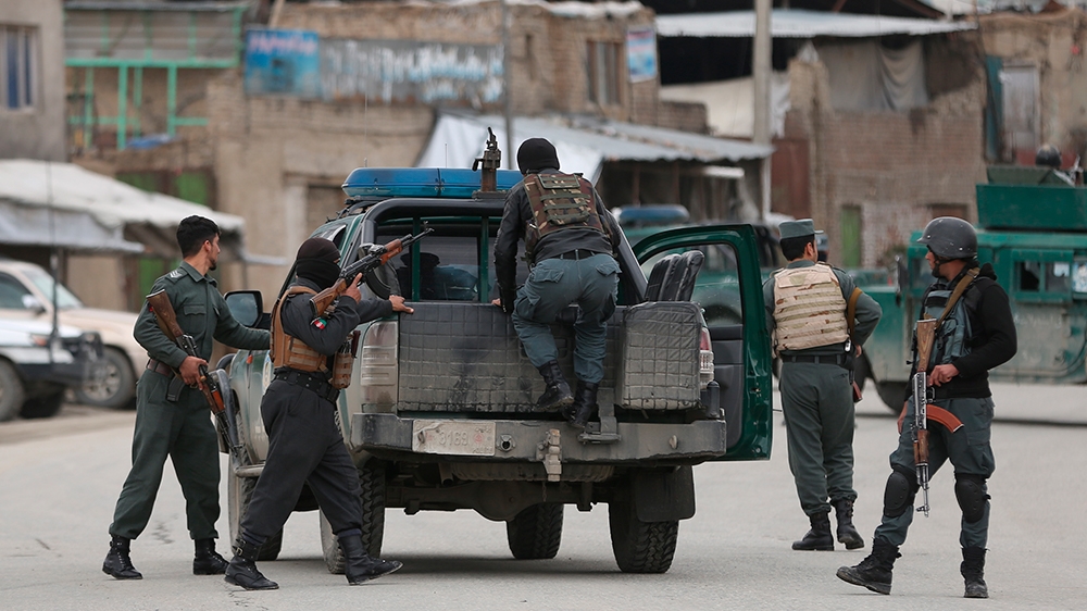 Afghan personnel arrive at the site of an attack in Kabul, Afghanistan, Wednesday, March 25, 2020. Gunmen stormed a religious gathering of Afghanistan''s minority Sikhs in their place of worship in the