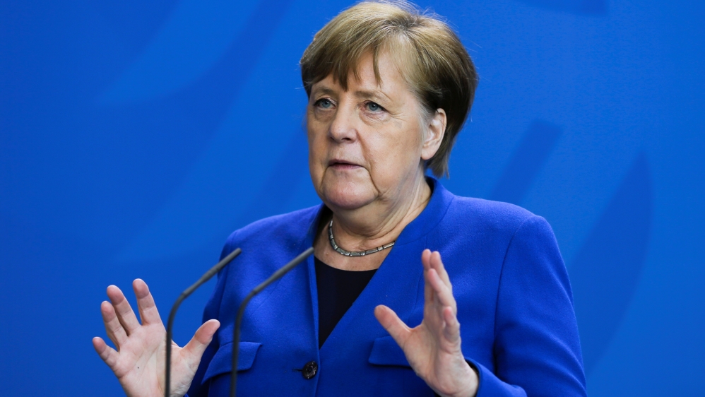 Merkel briefs the media about measures to avoid further spread of COVID-19