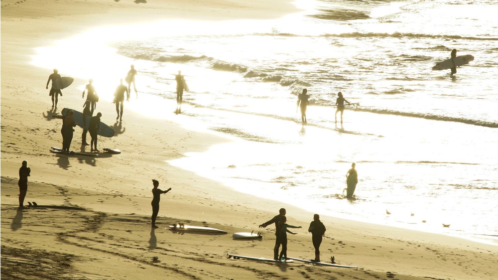 People were up early to surf as Bondi Beach was reopened after it was closed to curb the spread of the coronavirus