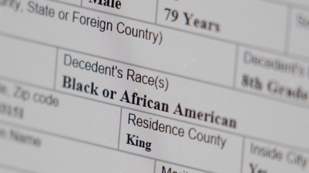 A working copy of a death certificate for a man who died of coronavirus disease (COVID-19) indicates that the man’s race was ‘Black or African American’, as seen on a computer screen