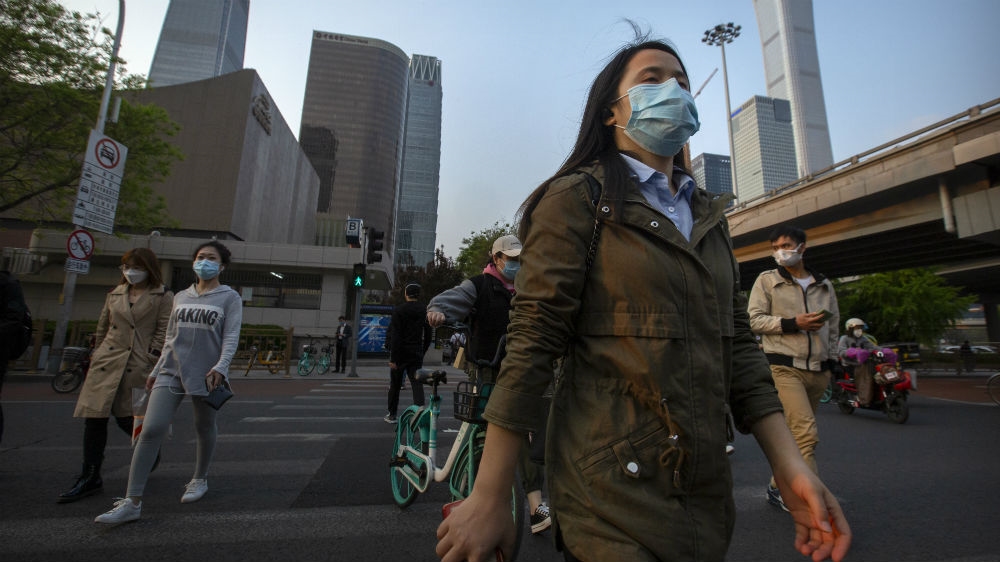 People are getting back to work in Beijing, but residents say life now is very different from what it was before the coronavirus appeared