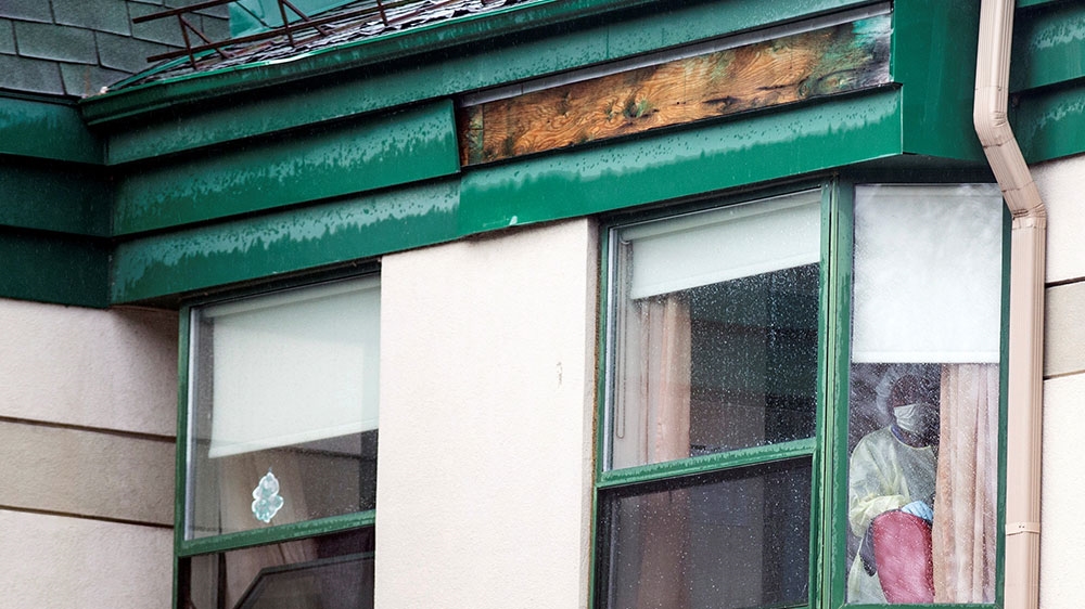 A worker at the Residence Herron, a long-term care facility, following a number of deaths from COVID-19, in Montreal