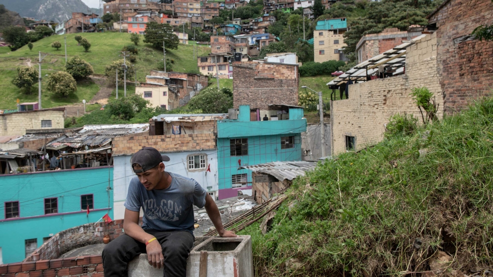 Red cloth can be seen hanging from the windows of the working-class district of Girardot