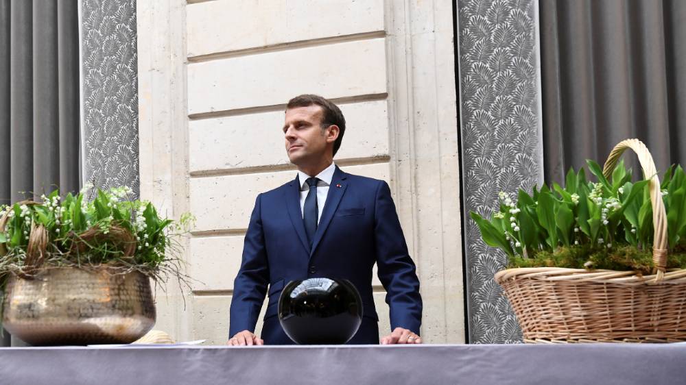 Macron says it is too soon to say whether French people can take holidays or not