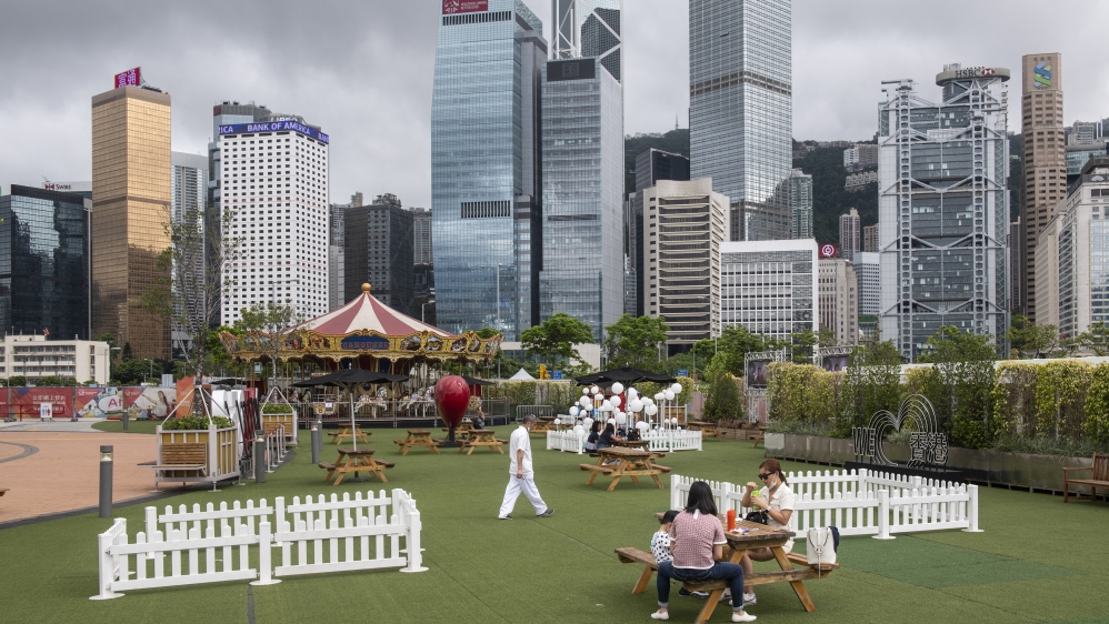 People enjoy their afternoon at Central harbourfront, Hong Kong