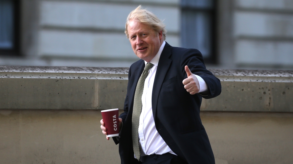 UK Prime Minister Boris Johnson returns to Downing Street after his daily walk in Westminster in London, United Kingdom [Anadolu Agency]