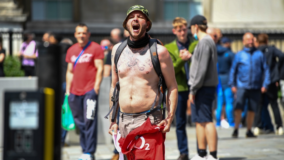 Hundreds of people linked to far-right groups gathered in central London
