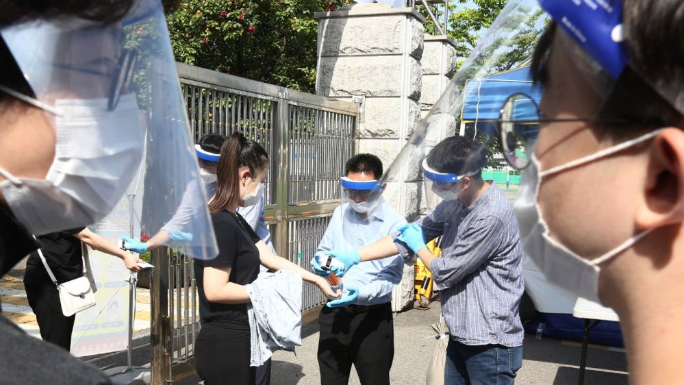 Public servants take their civil service exams on Saturday amid the coronavirus pandemic in South Korea