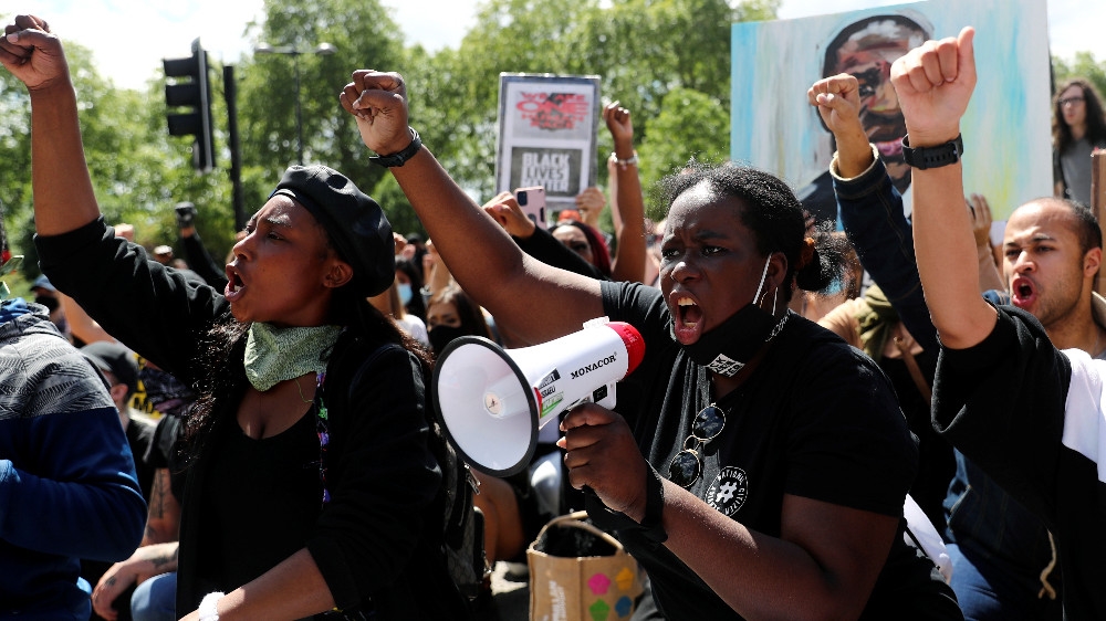 Anti-racism protesters gathered in central London even though organisers had told them not to attend fearing clashes