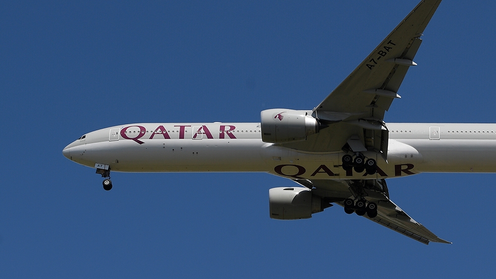 A Qatar Airways passenger plane comes in to land at London Heathrow airport following the outbreak of the coronavirus