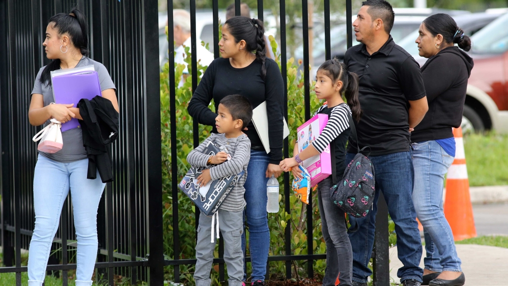 People waiting in line for their appointment at the Miramar Immigration and Customs facility, in Miramar, Florida