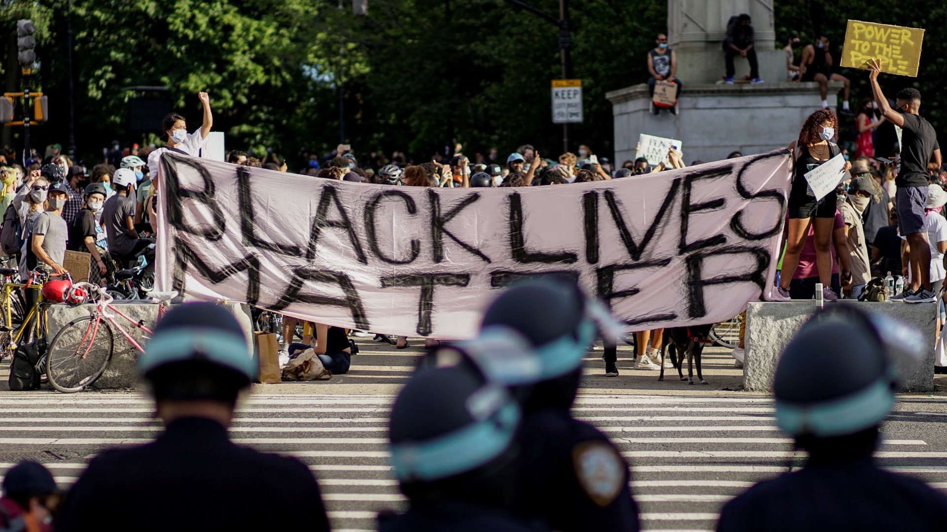 Demonstrators hold a Black Lives Matter banner during a protest against racial inequality in the aftermath of the death of George Floyd at the hands of police