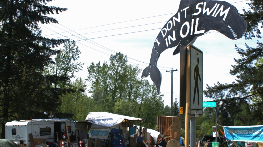 A camp set up by demonstrators opposed to the expansion of the Trans Mountain pipeline through the Canadian Rockies, stands outside the Kinder Morgan Inc oil storage facility on Burnaby Mountain above the harbour in Vancouver, Canada in 2018