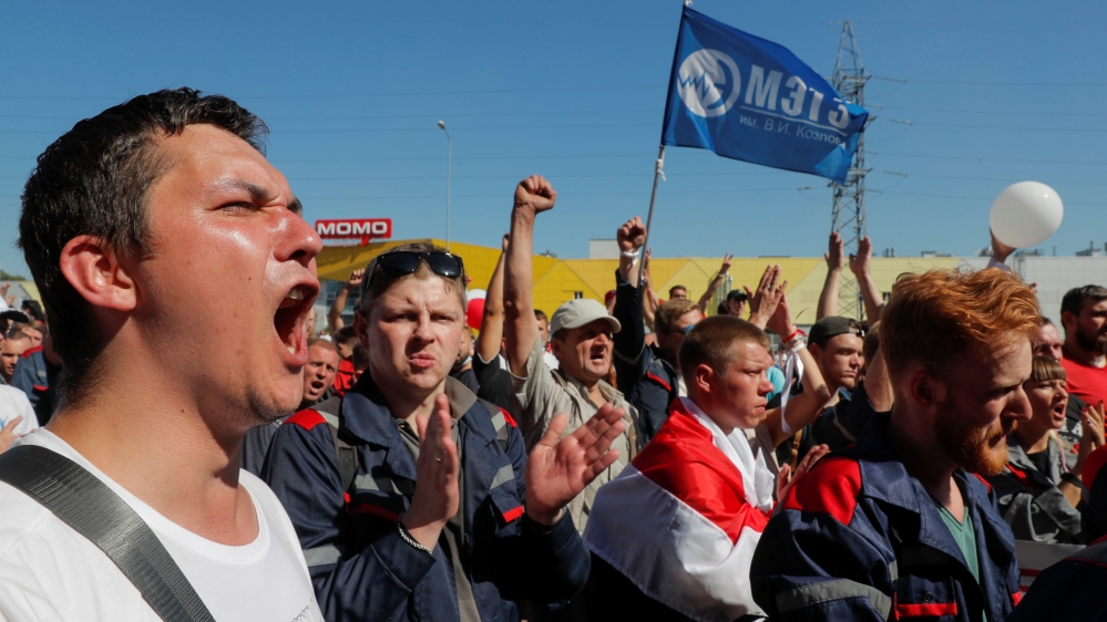 People protest near an MZKT plant – where heavy off-road vehicles are made – in Minsk
