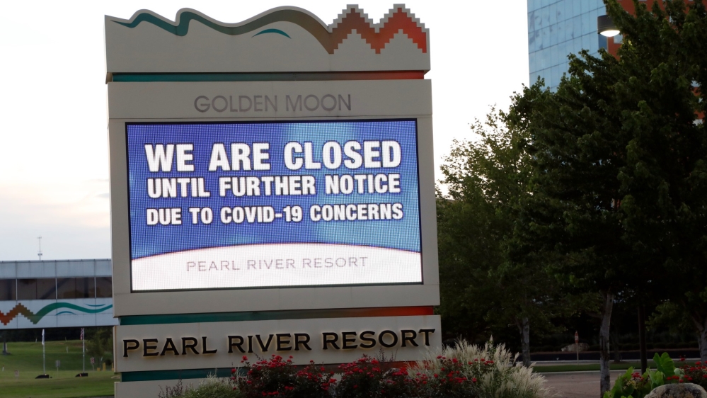 Instead of welcoming visitors to the Pearl River Resort, the marquee outside the Golden Moon Casino and Hotel, informs the public that the gaming venues, their hotels and the water park are closed in Philadelphia, Mississippi