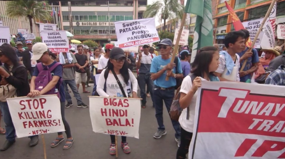 Farmers in Negros island rally against the government following the recent spate of killings of farmers [Al Jazeera 101 East Documentary: Duterte’s New War]