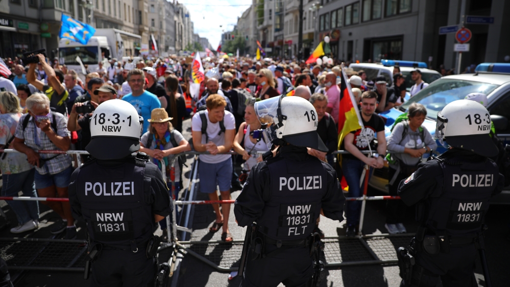 Thousands of people protest against coronavirus-related restrictions and government policy in Berlin