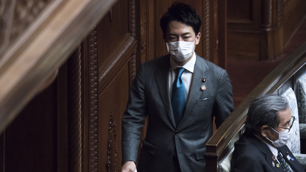 Japan’s environment minister Shinjiro Koizumi wearing a face mask attends an ordinary session at the upper house of Parliament in Tokyo