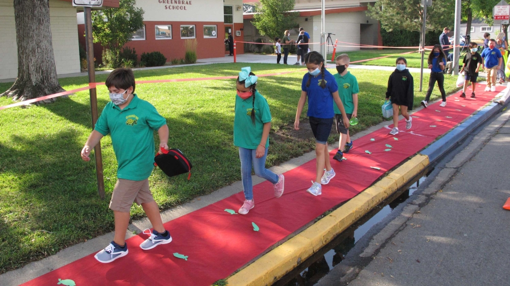Students return to Greenbrae Elementary School in Sparks, Nevada for the first time since March with mandatory masks and social distancing. Schools in the district are using a combination of classroom instruction and distance learning